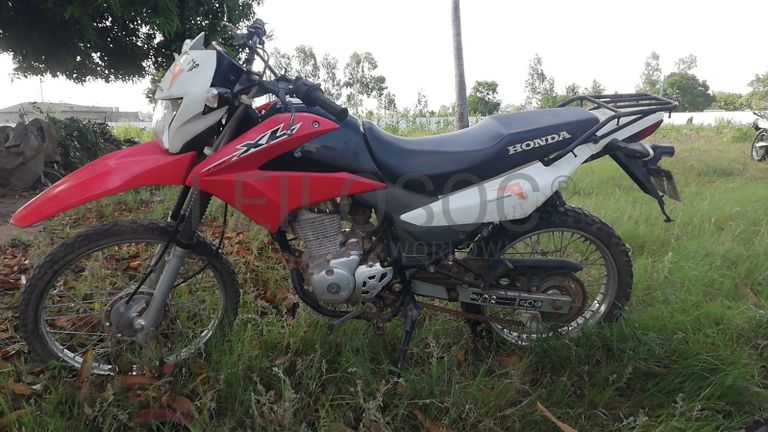 Motorizada de marca Honda XL LEK ·