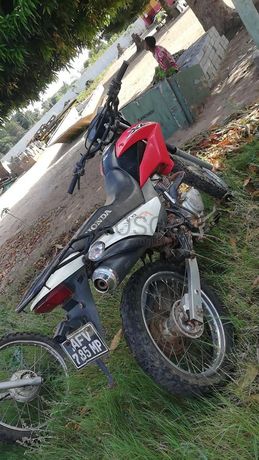 Motorizada de marca Honda XL LEK ·