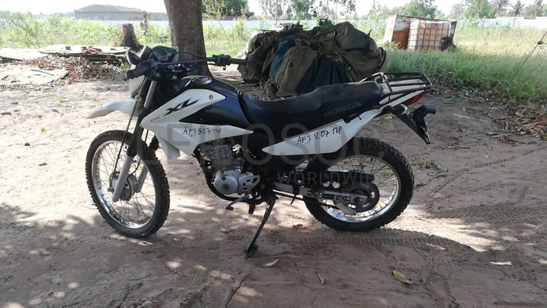Motorizada de marca Honda XL LEK 125, ·