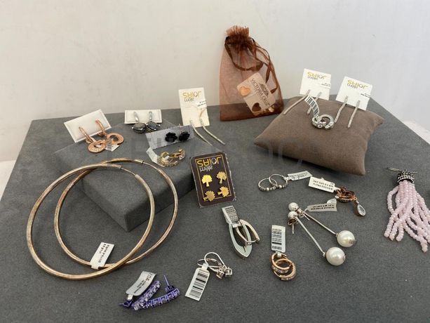 Brincos em prata e outros materiais