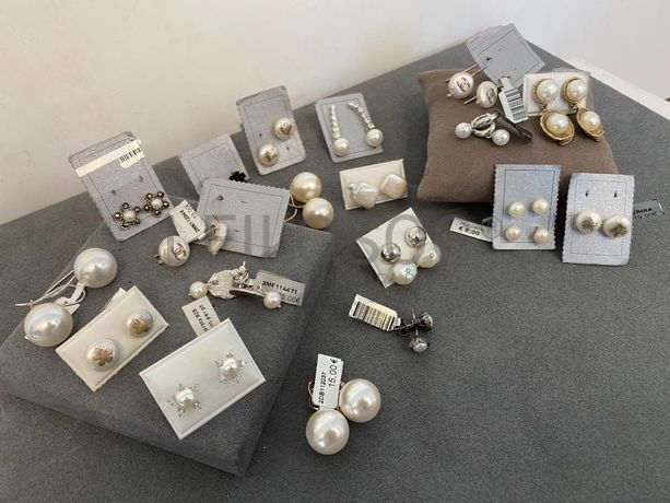 Brincos em prata e outros materiais