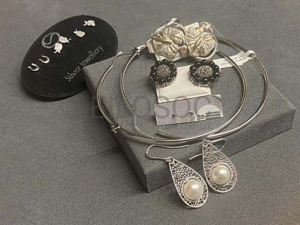 Brincos em prata e outros materiais