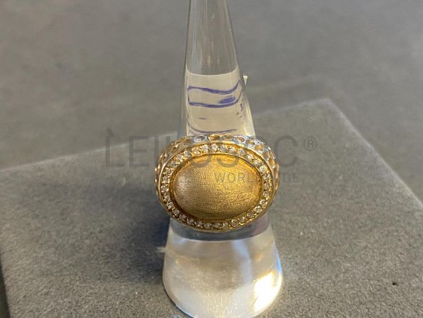 Anel em prata e outros materiais