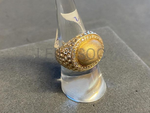 Anel em prata e outros materiais