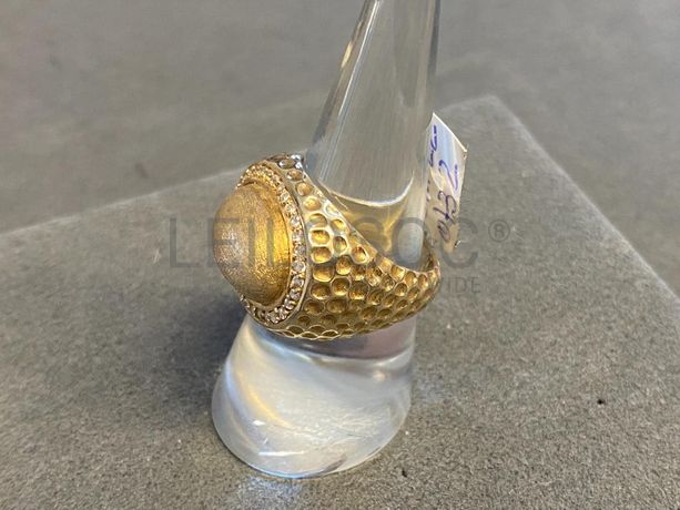 Anel em prata e outros materiais