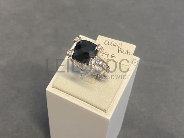 Anel em prata e outros materiais