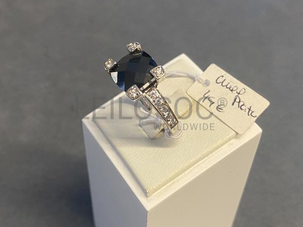 Anel em prata e outros materiais