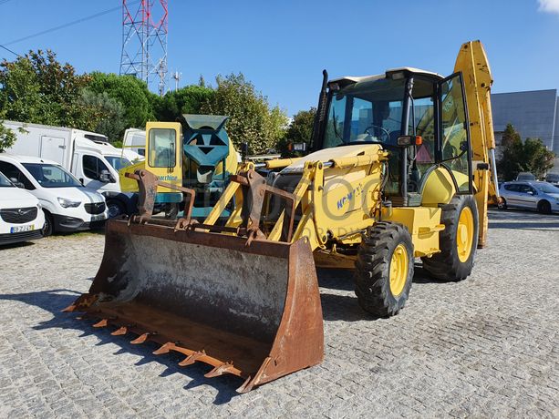 Retroescavadora Komatsu W93 R · Ano 2004