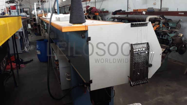 Máquina de confeção de malha