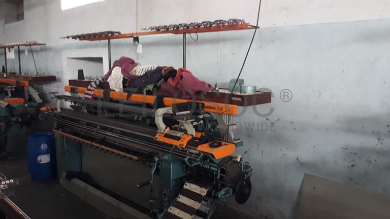 Máquina de confeção de malha