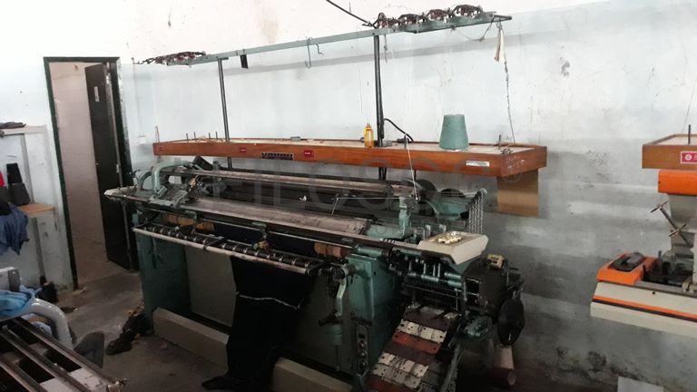 Máquina de confeção de malha