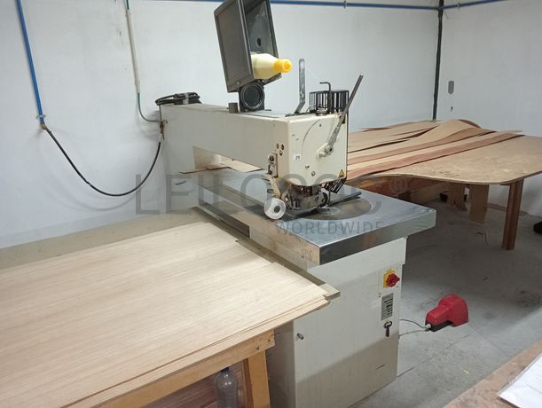 Máquina de coser folha