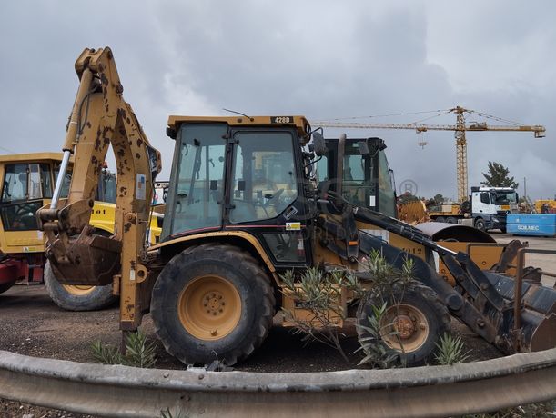 Conj. Ind. Pá e Retro de Pneus Caterpillar 428 DNF CM