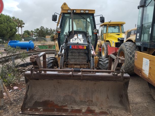 Conj. Ind. Pá e Retro de Pneus Caterpillar 428 DNF CM