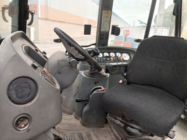 Conj. Ind. Pá e Retro de Pneus Caterpillar 428 DNF CM