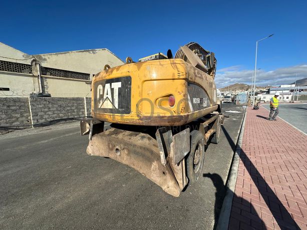 Escavadora de Pneus CATERPILLAR M315D