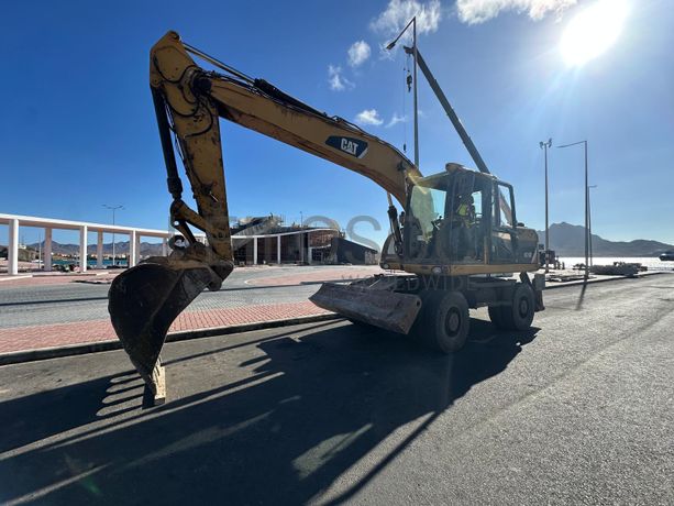 Escavadora de Pneus CATERPILLAR M315D