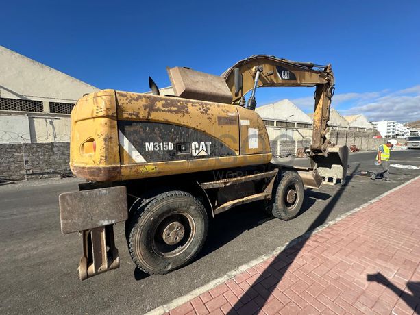 Escavadora de Pneus CATERPILLAR M315D