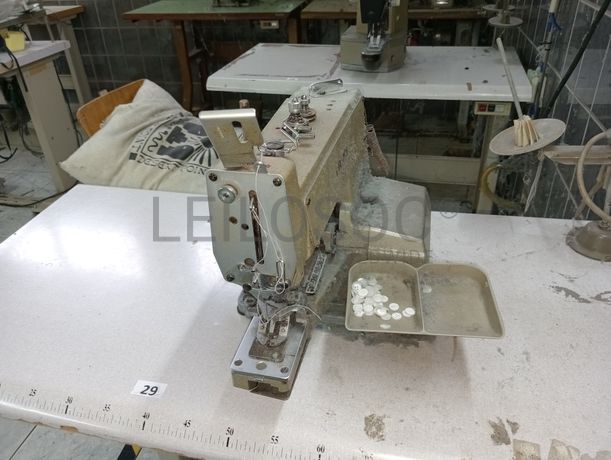 Máquina de pregar botões