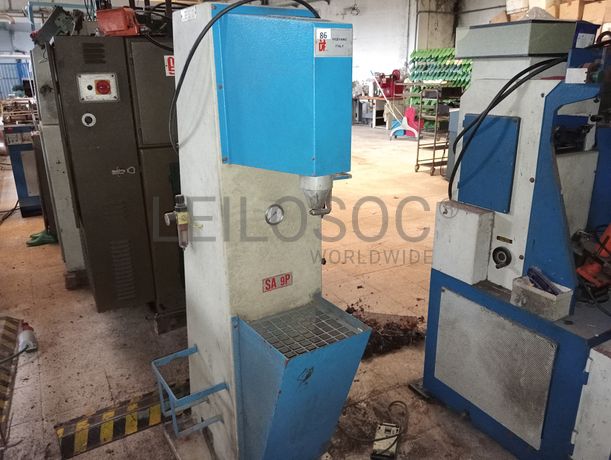 Máquinas de Cardar e Pregar saltos · Sifione