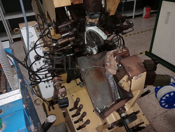 Máquina de Centrar Bicos