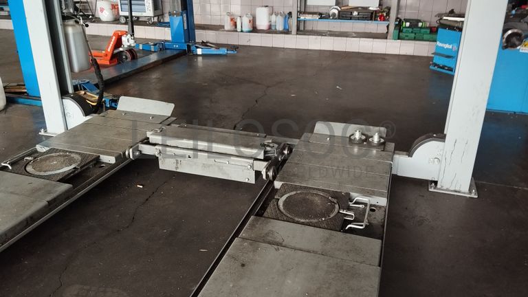 Elevador e Máquina de Alinhamento