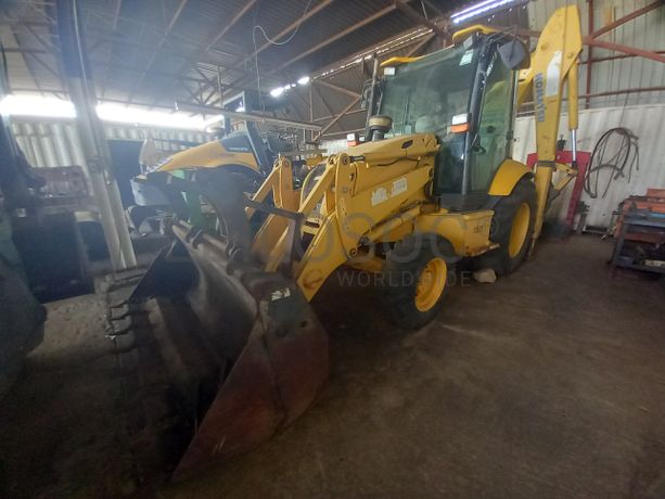 Conj. Ind. Pá e Retro de Pneus da marca KOMATSU, modelo WB93R-5