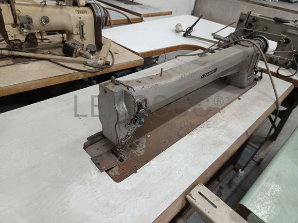 Máquina de Costura Taking