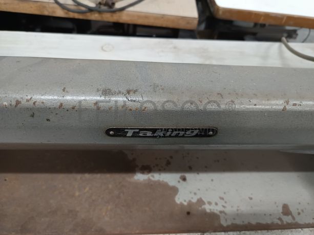 Máquina de Costura Taking